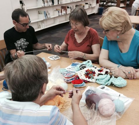 Craft Circle members work on projects at Sulzer Library
